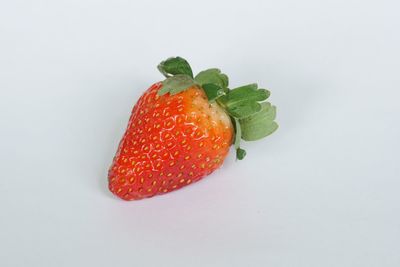 Close-up of strawberry against white background