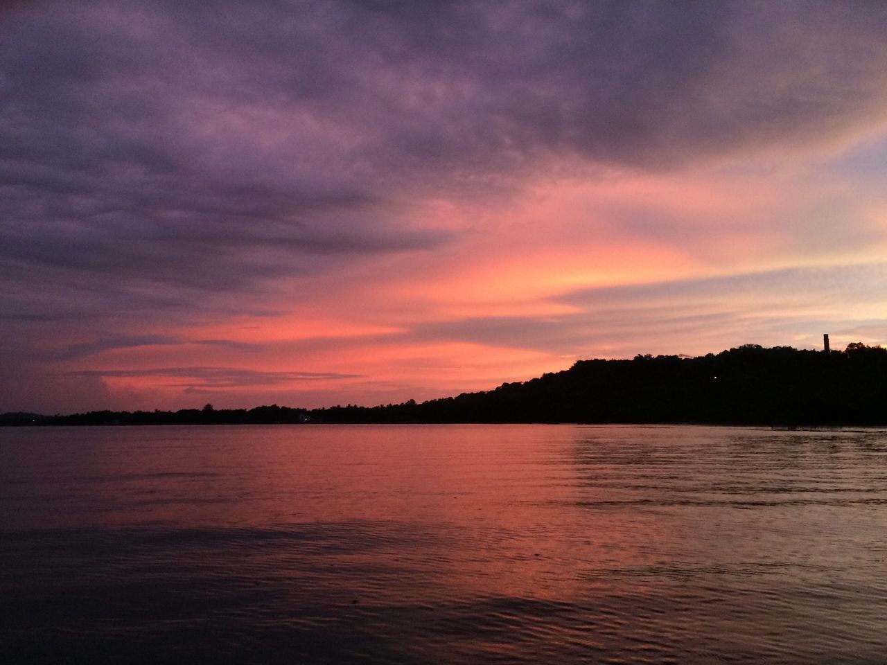 sunset, water, sky, waterfront, scenics, tranquil scene, silhouette, tranquility, beauty in nature, cloud - sky, orange color, reflection, idyllic, nature, cloud, dramatic sky, lake, cloudy, rippled, sea