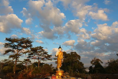 Low angle view of statue against sky