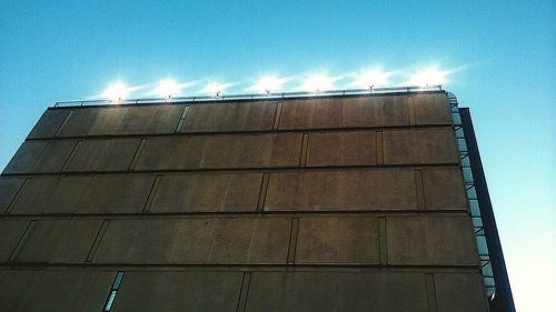 High section of building against cloudy sky