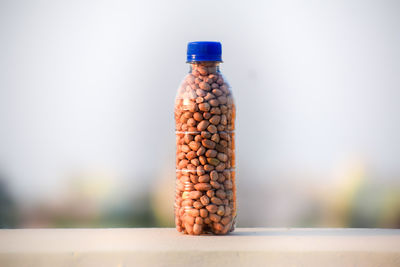 Close-up of water bottle against white background