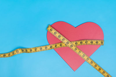 Close-up of heart shape sign on paper