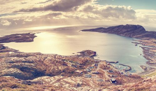  aerial view to bay with fishing village. distinctive scandinavian land with mountains, sea and bays