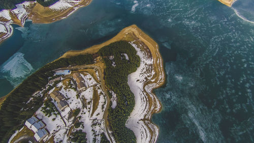 High angle view of sea and buildings