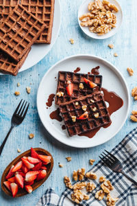 High angle view of fruits in plate on table