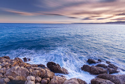 Scenic view of sea against sky during sunset