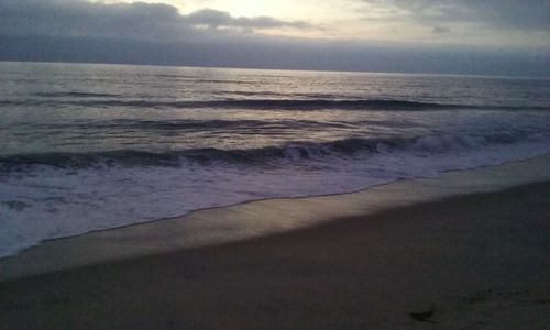 View of sea against cloudy sky