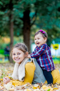 Portrait of smiling happy girl outdoors