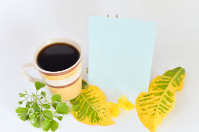 High angle view of coffee cup on table