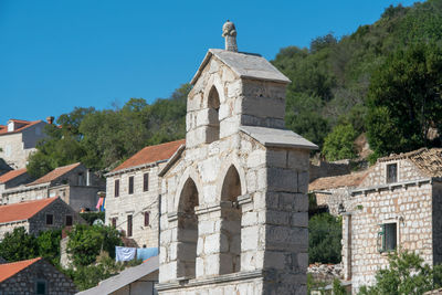 Low angle view of historic building against sky