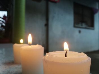 Three candles in a line for a religious ritual