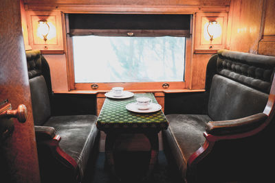Empty chairs and tables at home