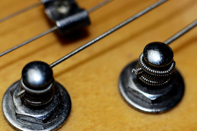 Close-up of guitar on table