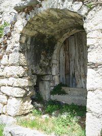 Low angle view of stone wall