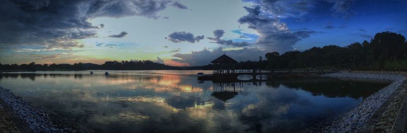 Scenic view of calm lake at sunset