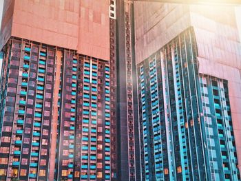 Low angle view of modern building in city against sky