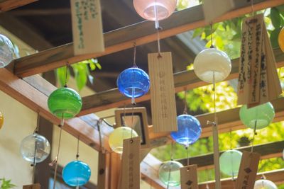 Low angle view of decorations hanging on ceiling