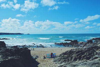 Scenic view of sea against cloudy sky