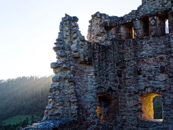 Low angle view of old ruins against sky