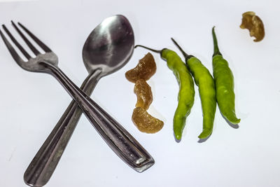 High angle view of eggs on table against white background