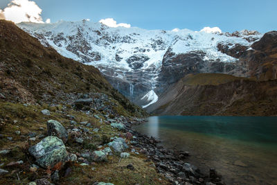 Scenic view of waterfall against sky