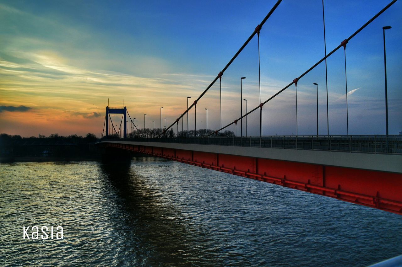 VIEW OF RIVER AT SUNSET