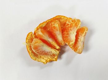 Close-up of fruit against white background