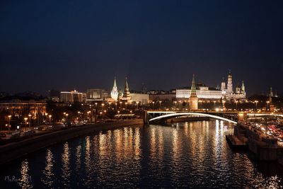 Illuminated buildings at waterfront