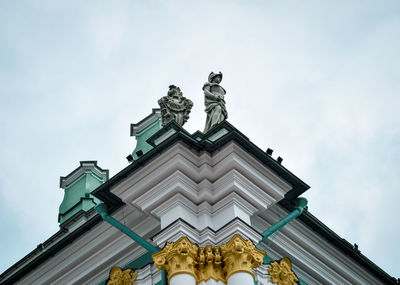 Low angle view of statue of building against sky