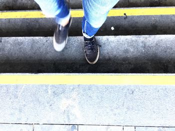 Low section of man on steps