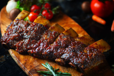 High angle view of meat on cutting board