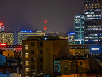 High angle view of buildings at night