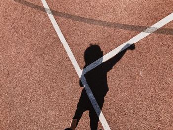 High angle view of shadow on floor