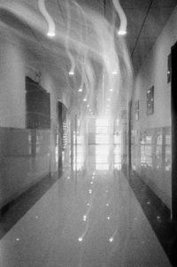 Empty road in illuminated building