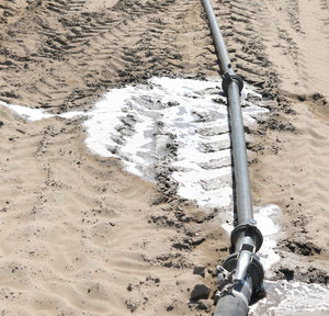 High angle view of chain on beach