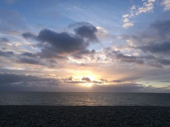 Scenic view of sea against sky during sunset