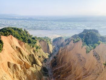 High angle view of land against sky