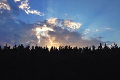 Scenic view of landscape against cloudy sky