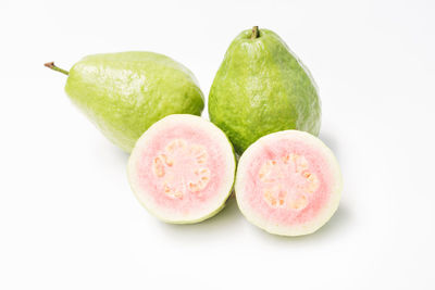 Close-up of apples on white background