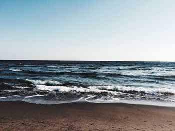 Scenic view of sea against clear sky