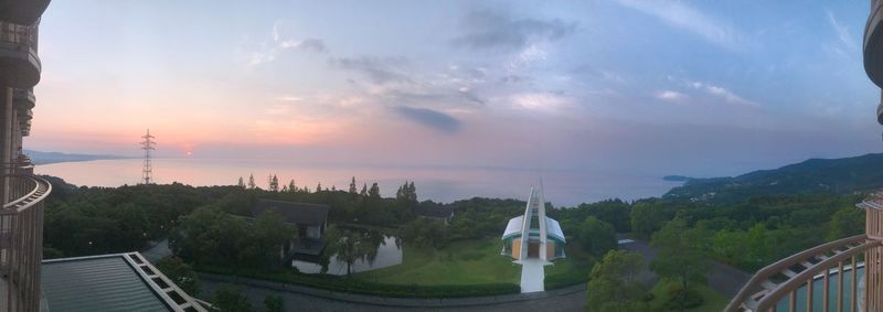 Panoramic view of buildings against sky during sunset