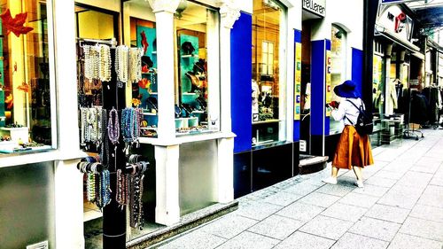 Full length of man standing at store