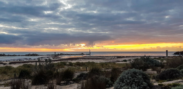 Scenic view of sea against sky during sunset