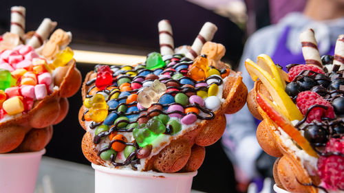 Close-up of multi colored candies on table