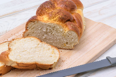 High angle view of bread on cutting board