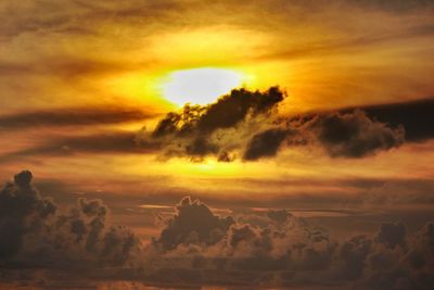 Scenic view of dramatic sky over landscape