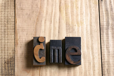 High angle view of text on wooden table