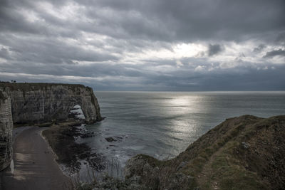 Scenic view of sea against cloudy sky