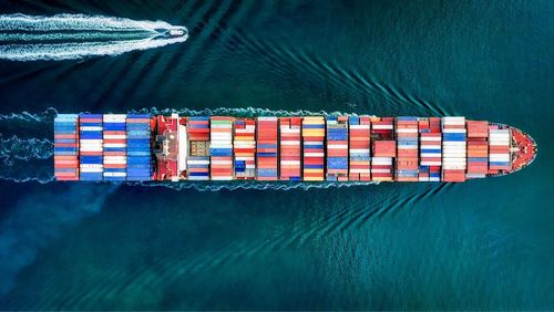 High angle view of container ship in sea