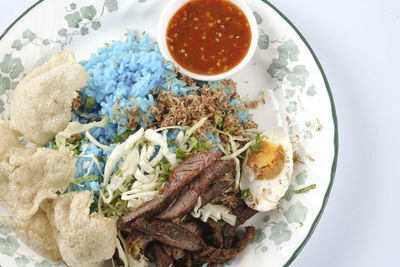 High angle view of breakfast served on table